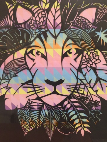 $200 NZD unframed Lion with leaves Black with colourful geometric backing A3